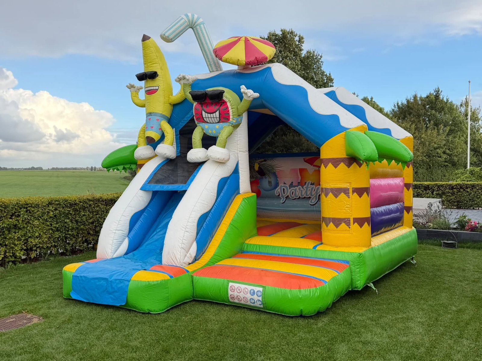 Springkussen Partystyle Multiplay met glijbaan huren Groningen Ten Post